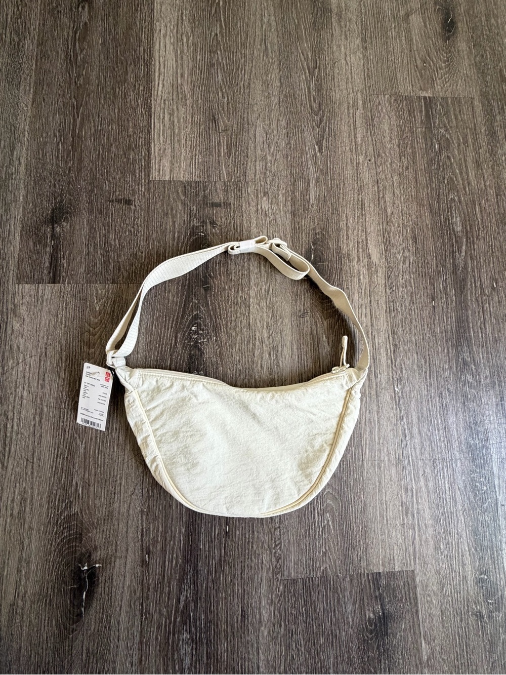 Uniqlo Crescent Crossbody Bag in Cream